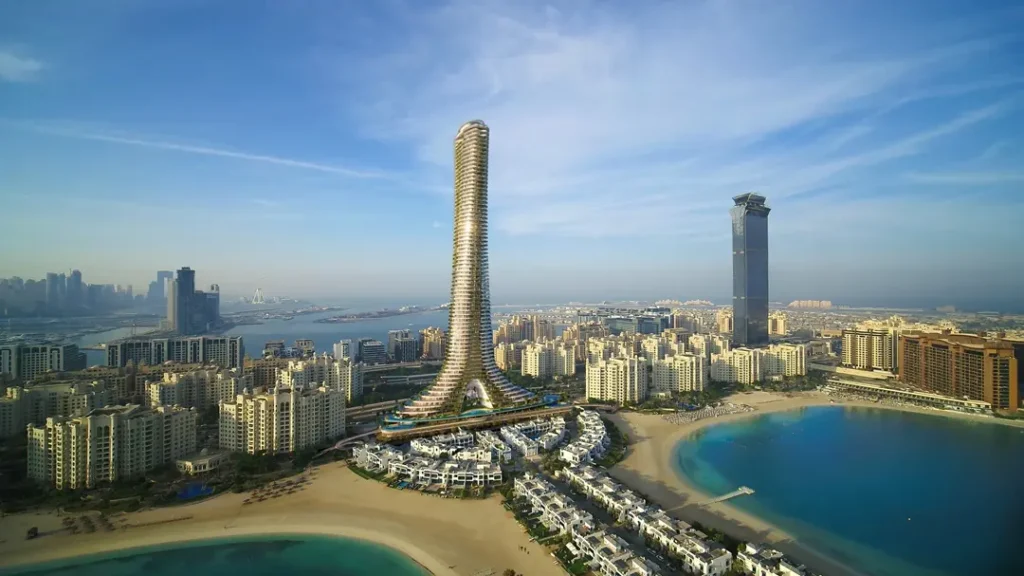 Aerial view of Como Residences tower on Palm Jumeirah, Dubai — an architectural masterpiece rising above the island’s skyline, surrounded by beachfront villas and turquoise waters — curated by Tohid Fetrat.