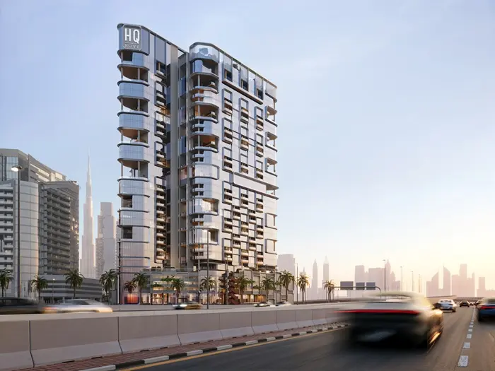 HQ by Rove exterior view from Sheikh Zayed Road in Business Bay Dubai – modern commercial tower with Burj Khalifa backdrop, presented by Tohid Fetrat