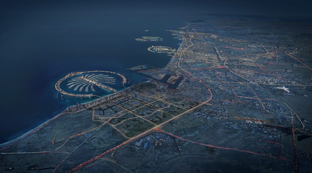 Night aerial rendering of Palm Jebel Ali and Dubai coastline, highlighting the palm structure, city lights, and masterplan layout.