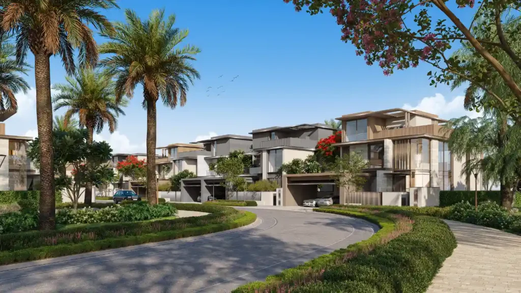 Nad Al Sheba Gardens by Meraas — tree-lined residential streets with contemporary villas and landscaped greenery in a luxury Dubai community — presented by Tohid Fetrat.