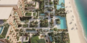 Aerial view of the Central Oasis amenities at Alba Residences, Dorchester Collection by OMNIYAT, on Palm Jumeirah, showcasing landscaped gardens, water features, private pools, and direct beachfront access overlooking the Gulf. Presented by Tohid Fetrat.