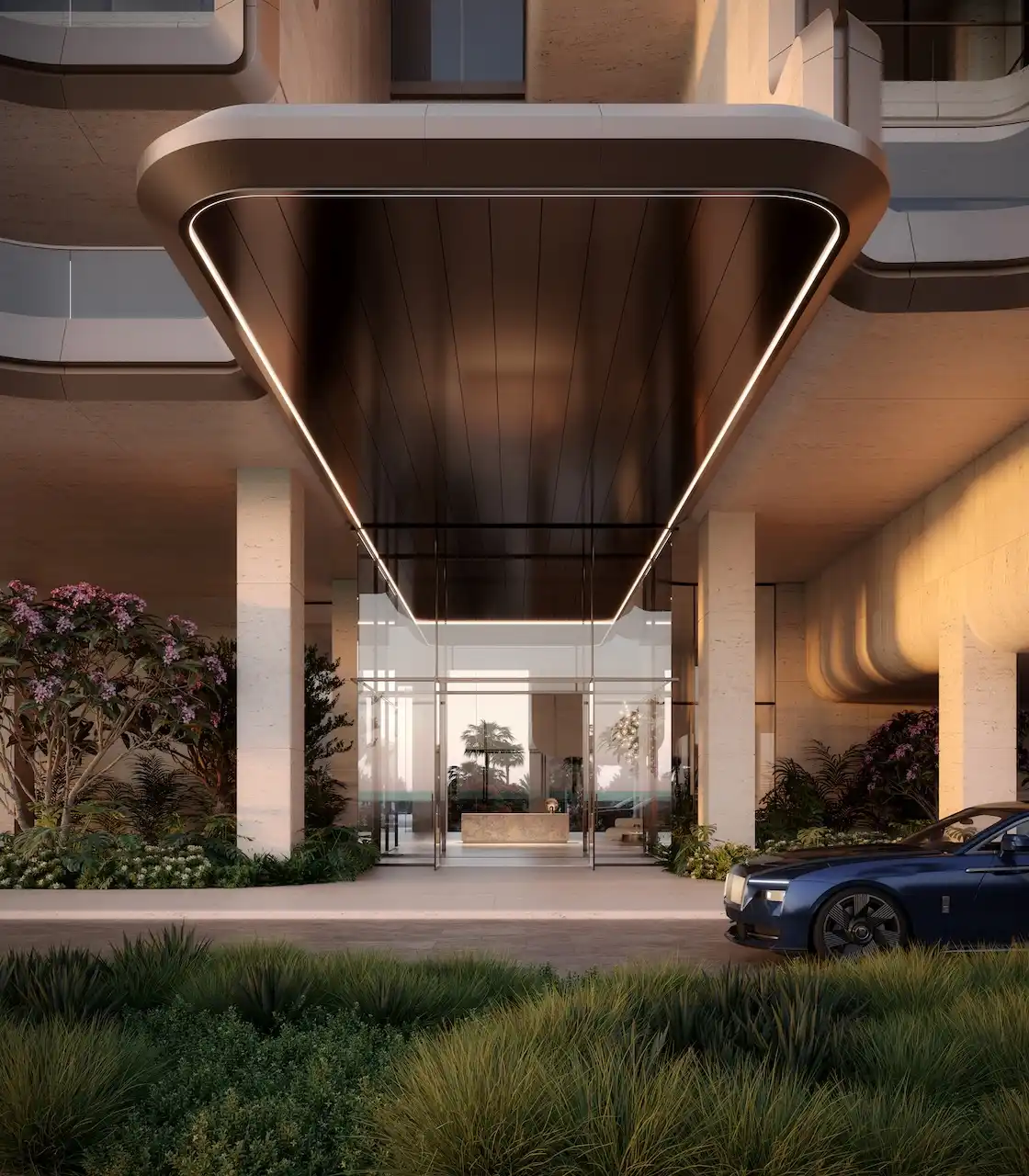Grand arrival entrance of Alba Residences, Dorchester Collection by OMNIYAT on Palm Jumeirah, featuring sculptural architectural canopy, luxury drop off area, landscaped surroundings, and refined beachfront living. Presented by Tohid Fetrat.