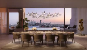 Luxury dining interior at Alba Residences, Dorchester Collection by OMNIYAT on Palm Jumeirah, featuring panoramic Dubai skyline views, bespoke lighting, and refined contemporary design. Presented by Tohid Fetrat.