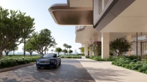 Private residential arrival entrance at Alba Residences, Dorchester Collection by OMNIYAT on Palm Jumeirah, featuring refined architecture, landscaped driveways, and exclusive luxury access. Presented by Tohid Fetrat.