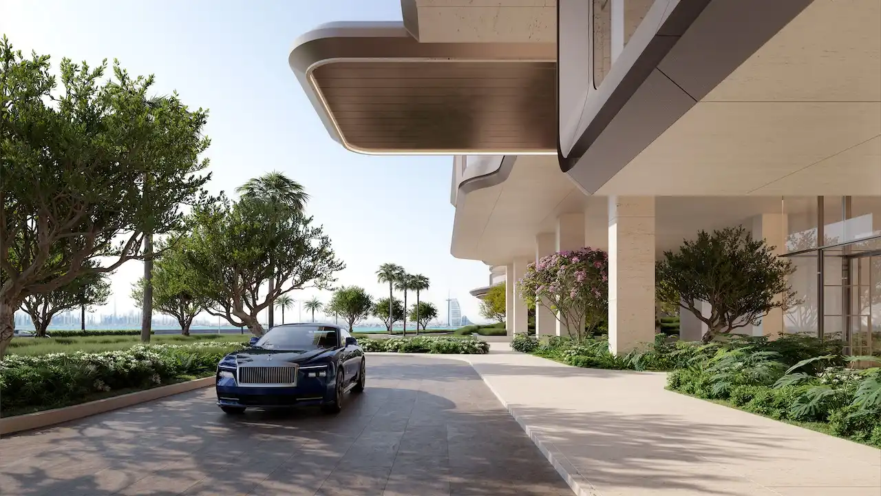 Private residential arrival entrance at Alba Residences, Dorchester Collection by OMNIYAT on Palm Jumeirah, featuring refined architecture, landscaped driveways, and exclusive luxury access. Presented by Tohid Fetrat.
