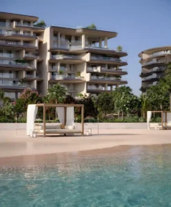 نمای ساحل اختصاصی پروژه آلبا رزیدنسز، مجموعه دورچستر کالکشن توسط امنیات در پالم جمیرا، با کابانا های خصوصی، معماری مدرن کم ارتفاع، فضای سبز استوایی و دسترسی مستقیم به خلیج. ارائه شده توسط توحید فطرت.