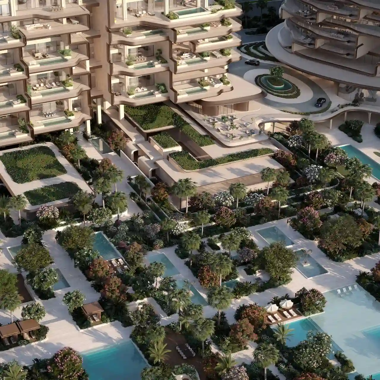 Aerial view of the wellness centre and landscaped gardens at Alba Residences by Dorchester Collection and OMNIYAT on Palm Jumeirah, featuring resort style pools, private cabanas, and lush greenery. Presented by Tohid Fetrat.