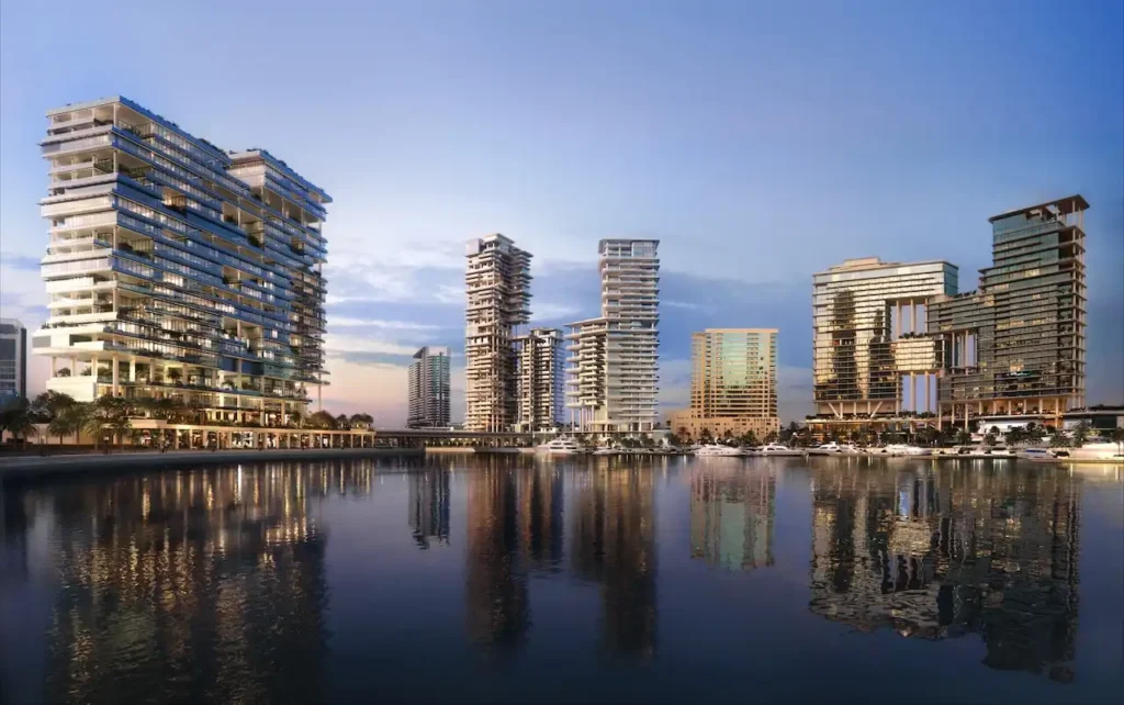 Business Bay, Marasi Bay’de yer alan ENARA by OMNIYAT projesinin sahil boyunca uzanan skyline gorunumu, modern ticari kuleler ve marina manzarasi ile one cikmaktadir. Tohid Fetrat tarafindan sunulmustur.