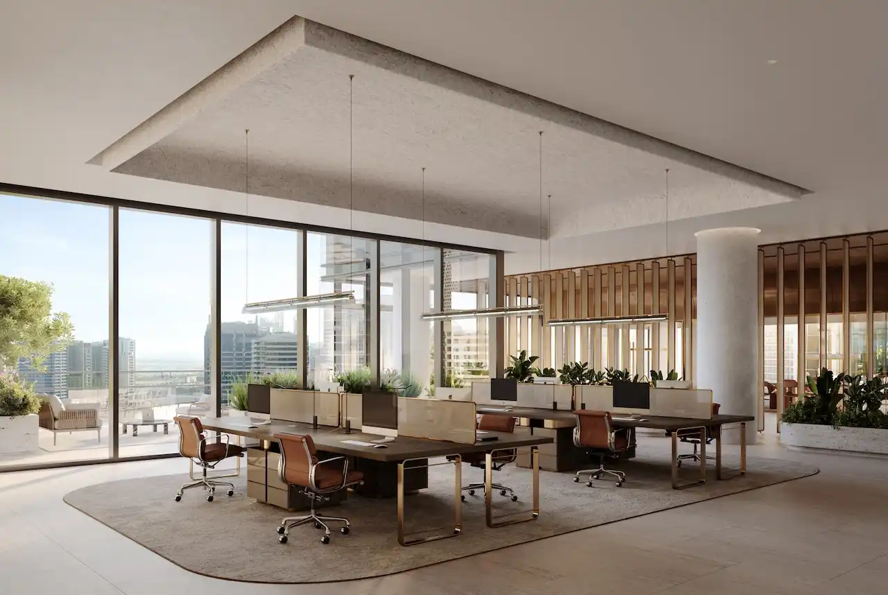 Type B open plan workstation interior at ENARA by OMNIYAT featuring shared executive desks, ergonomic seating, integrated planters, refined ceiling panels, and floor to ceiling glazing with Business Bay city views in Dubai. Presented by Tohid Fetrat.