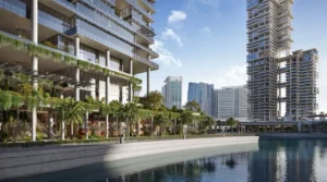 Waterfront promenade and retail frontage at ENARA by OMNIYAT in Business Bay, featuring landscaped walkways, canal-side views, and contemporary commercial architecture. Presented by Tohid Fetrat.