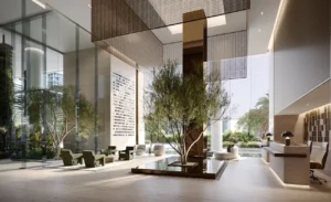 West Tower lobby interior at ENARA by OMNIYAT featuring a double height atrium, integrated indoor trees, water features, refined lounge seating, sculptural ceiling panels, and floor to ceiling glazing in Business Bay Dubai. Presented by Tohid Fetrat.