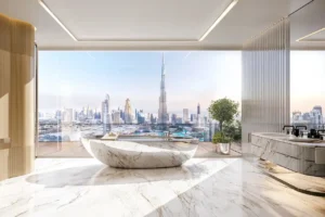 Ultra luxury bathroom interior at Bugatti Residences by Binghatti in Business Bay Dubai, featuring marble finishes, freestanding bathtub, and panoramic Burj Khalifa skyline view. Presented by Tohid Fetrat.
