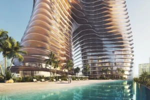 Infinity pool and waterfront exterior at Bugatti Residences by Binghatti in Business Bay Dubai, featuring sculptural twin towers, flowing balconies, palm lined leisure areas and ultra luxury resort style living. Presented by Tohid Fetrat.