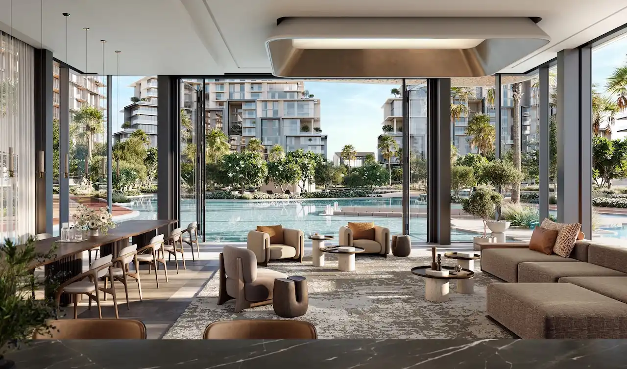 City Walk Crestlane by Meraas showing a luxury community hub interior with floor to ceiling windows elegant seating and panoramic views of the lagoon style pool and landscaped residences presented by Tohid Fetrat.