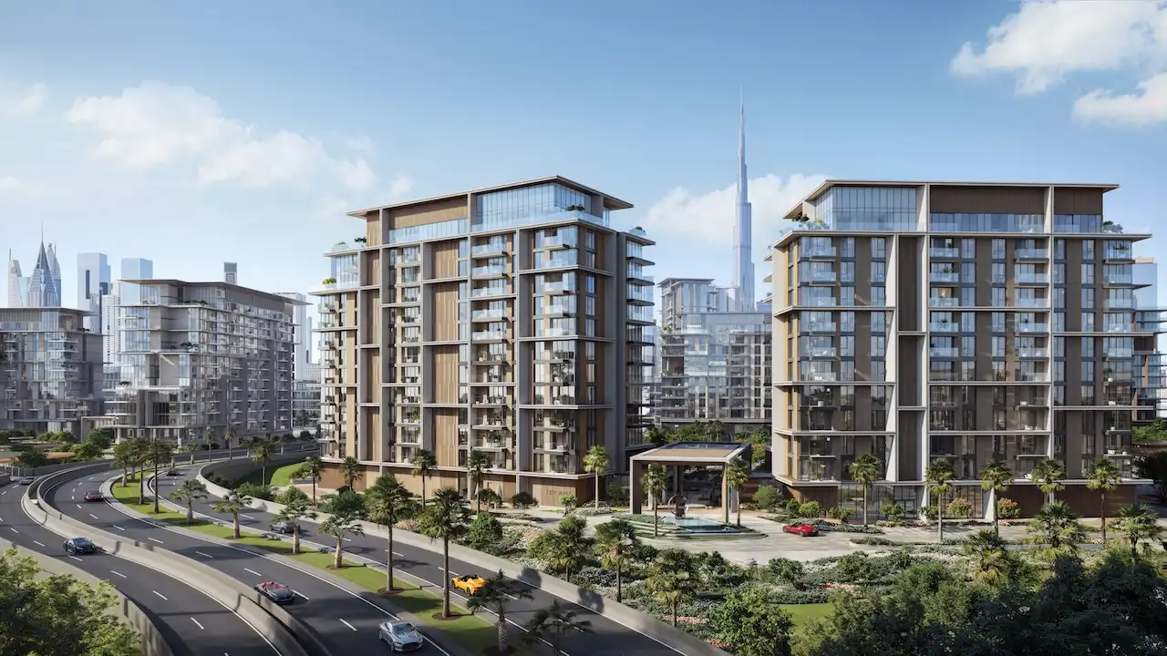 City Walk Crestlane by Meraas showing luxury modern residences with glass facades landscaped surroundings and a clear view of the Dubai skyline including the Burj Khalifa presented by Tohid Fetrat.