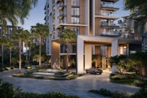 City Walk Crestlane by Meraas showing a luxury illuminated entrance with modern columns cascading fountain landscaped greenery and an elegant arrival experience presented by Tohid Fetrat.