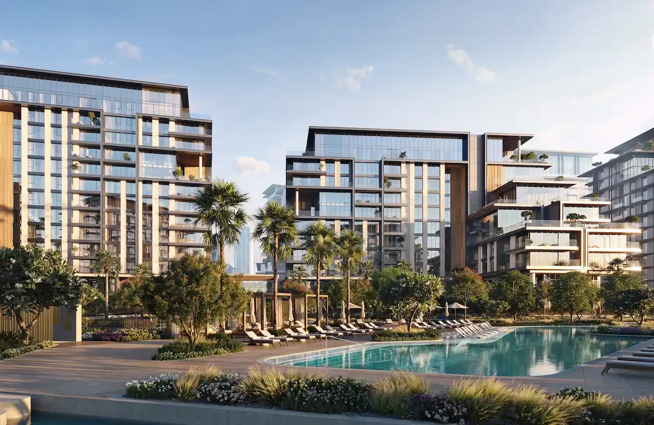 City Walk Crestlane by Meraas showing luxury modern residences with landscaped greenery sun loungers and a resort style pool in a premium Dubai community presented by Tohid Fetrat.
