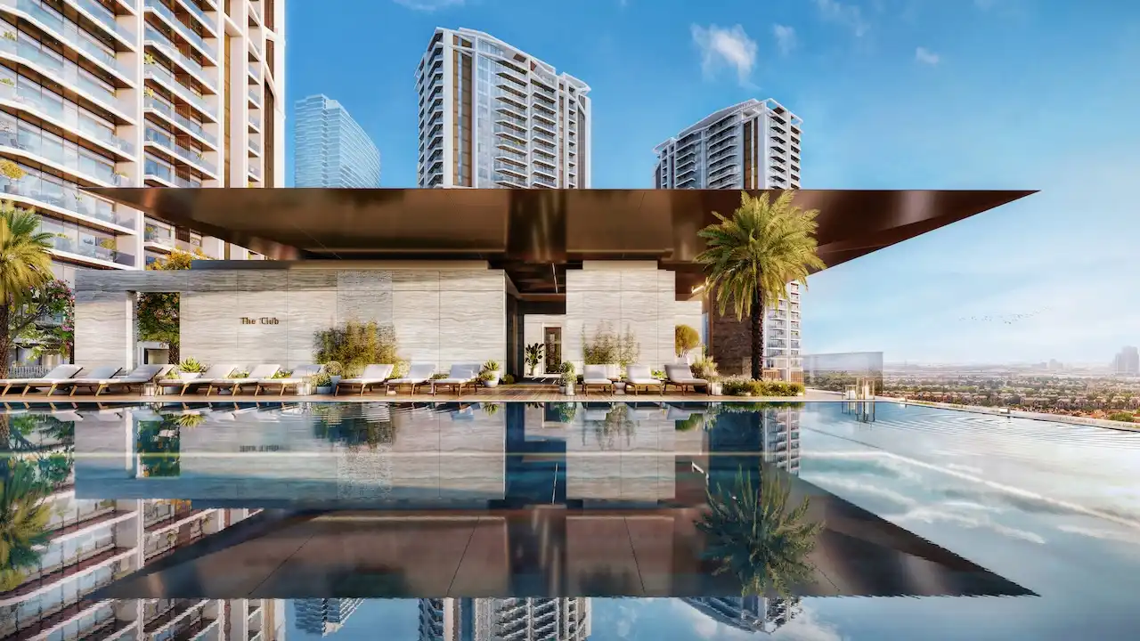 Adult infinity pool at Eltiera Views, showcasing a luxury leisure area with skyline views and modern architecture in Dubai. Presented by Tohid Fetrat.