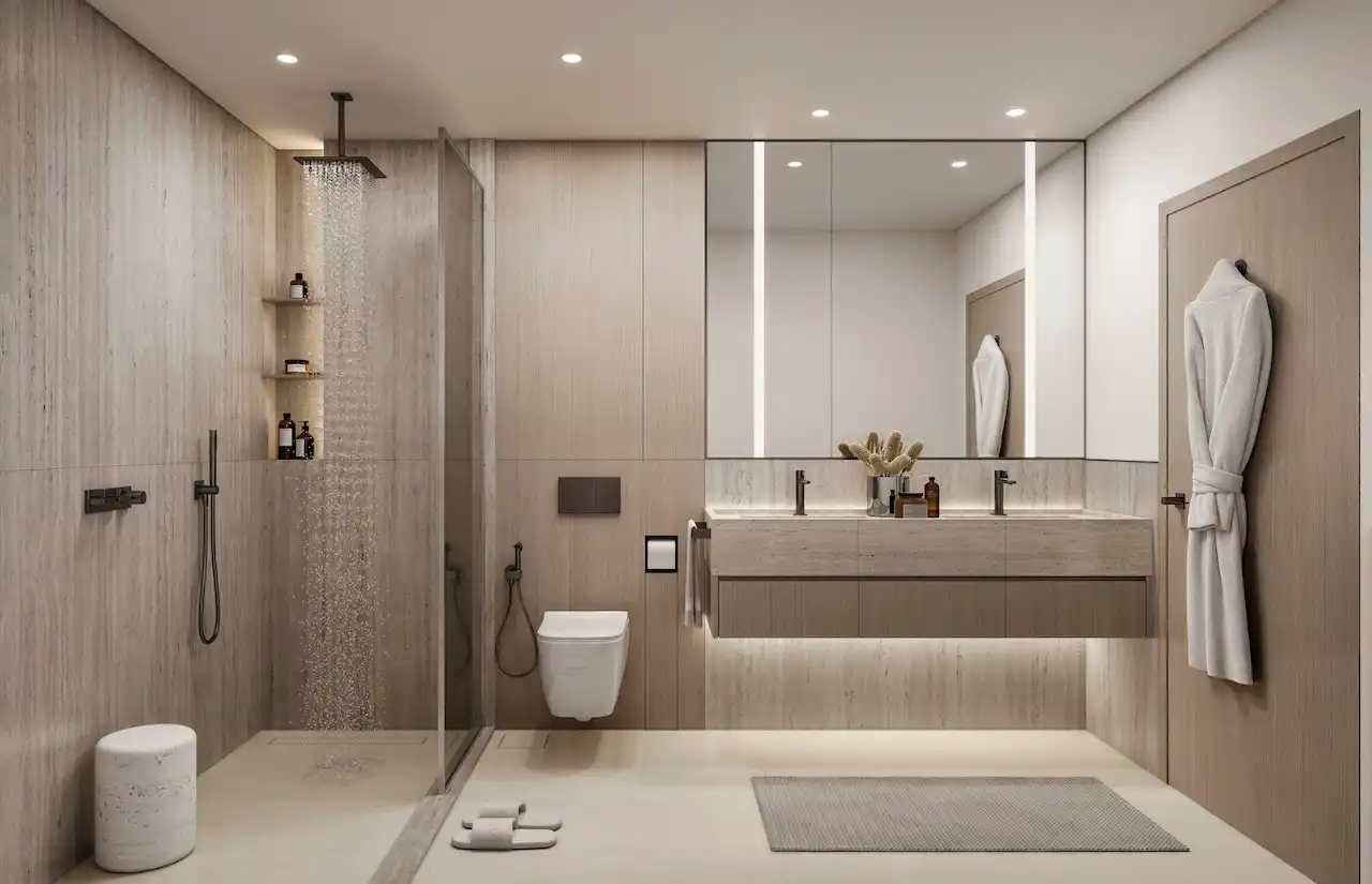 Luxury bathroom at Eltiera Views featuring a walk-in shower, modern vanity, and elegant finishes, designed for a refined residential lifestyle in Dubai. Presented by Tohid Fetrat.