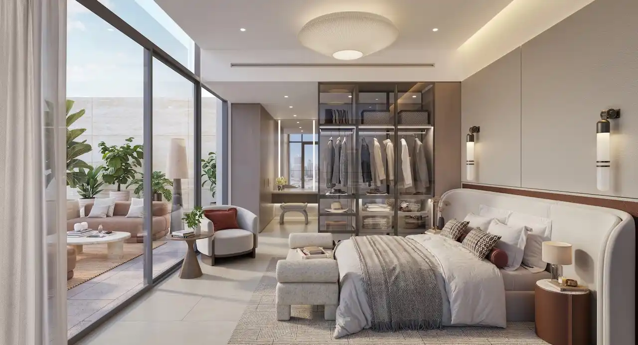 Luxury bedroom at Eltiera Views featuring a spacious layout, modern furnishings, walk-in wardrobe, and floor-to-ceiling windows, offering a refined residential lifestyle in Dubai. Presented by Tohid Fetrat.