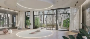 Luxury dance and wellness studio at Eltiera Views featuring a spacious circular layout, soft ambient lighting, floor to ceiling windows, and serene interior design, creating a refined wellness environment in Dubai. Presented by Tohid Fetrat.