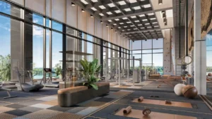 Luxury fitness studio at Eltiera Views featuring modern gym equipment, floor to ceiling windows, natural light, and landscaped views, offering a premium wellness focused workout experience in Dubai. Presented by Tohid Fetrat.