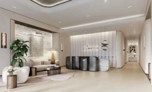 Luxury main lobby at Eltiera Views by Ellington featuring refined interiors, elegant seating, and contemporary architectural design, creating a premium residential welcome in Dubai. Presented by Tohid Fetrat.