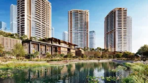 Outdoor lifestyle scene at Eltiera Views featuring a landscaped pedestrian area, cafe seating, and luxury residential towers in Dubai. Presented by Tohid Fetrat.