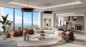 Luxury penthouse living and dining area at Eltiera Views featuring open-plan design, floor-to-ceiling windows, elegant furnishings, and panoramic city views, offering an elevated residential lifestyle in Dubai. Presented by Tohid Fetrat.