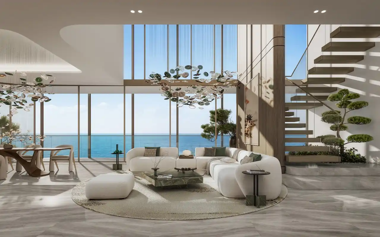 Hado duplex living room with double height ceiling panoramic sea view sculptural chandelier modern furniture and floating staircase in the SIORA community by Beyond presented by Tohid Fetrat.