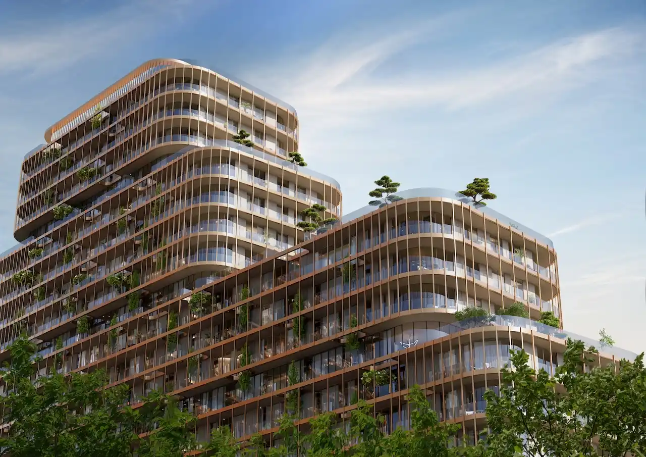 Upper facade of Hado in the SIORA community by Beyond showing cascading terraces curved glass architecture vertical greenery and rooftop trees presented by Tohid Fetrat.