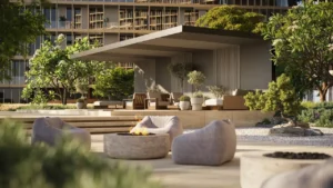 Hado Zen Lounge in the SIORA community by Beyond featuring a shaded pavilion fire pit modern outdoor seating and lush landscaping presented by Tohid Fetrat.