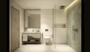 Modern bathroom interior in a 3 bedroom apartment at MJL Nourelle in Madinat Jumeirah Living Dubai, featuring marble wall finishes, walk in rain shower, minimalist vanity and refined contemporary design. Presented by Tohid Fetrat.
