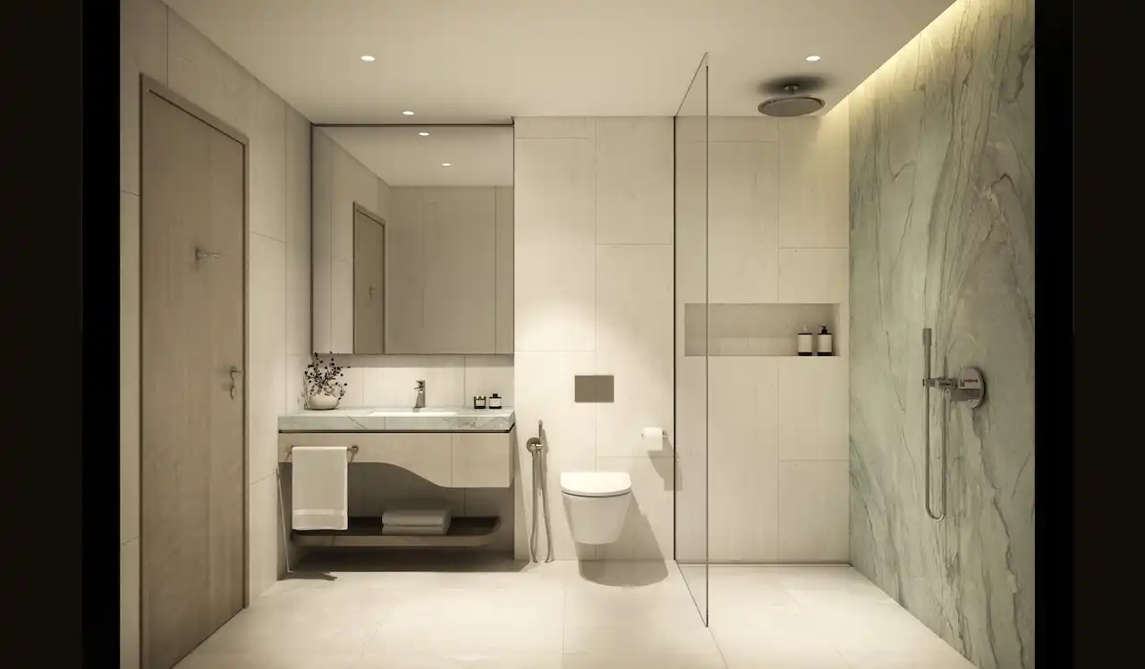 Modern bathroom interior in a 3 bedroom apartment at MJL Nourelle in Madinat Jumeirah Living Dubai, featuring marble wall finishes, walk in rain shower, minimalist vanity and refined contemporary design. Presented by Tohid Fetrat.