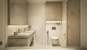 Minimalist bathroom at MJL Nourelle in Madinat Jumeirah Living Dubai, featuring marble vanity, integrated storage, walk in shower, premium sanitary fittings and a calm neutral interior palette. Presented by Tohid Fetrat.
