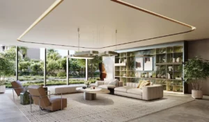Residents lounge and lobby seating area at MJL Nourelle in Madinat Jumeirah Living Dubai, featuring elegant interior design, soft neutral tones, natural greenery views and a refined communal atmosphere. Presented by Tohid Fetrat.