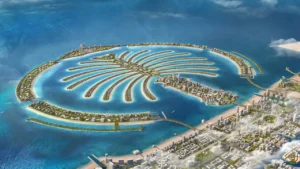Aerial masterplan view of Palm Jebel Ali showing the iconic palm-shaped island with residential fronds, beachfront communities, and waterfront developments in Dubai on the Gulf. Presented by Tohid Fetrat.