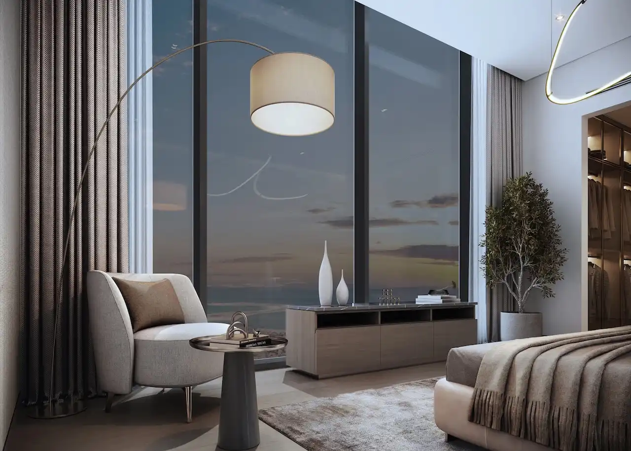 Sobha SkyParks master bedroom featuring floor to ceiling windows, panoramic views, refined lighting, and modern luxury interior design in Dubai prepared by Tohid Fetrat.