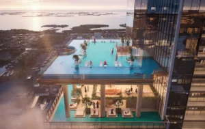 Sky infinity pool at Sobha SkyParks overlooking Dubai and the Gulf at sunset presented by Tohid Fetrat.