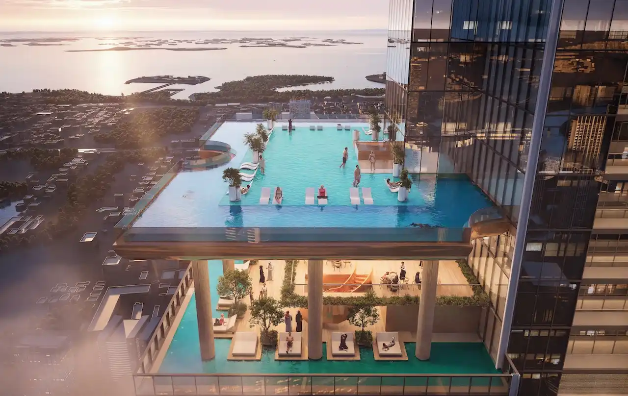 Sky infinity pool at Sobha SkyParks overlooking Dubai and the Gulf at sunset presented by Tohid Fetrat.