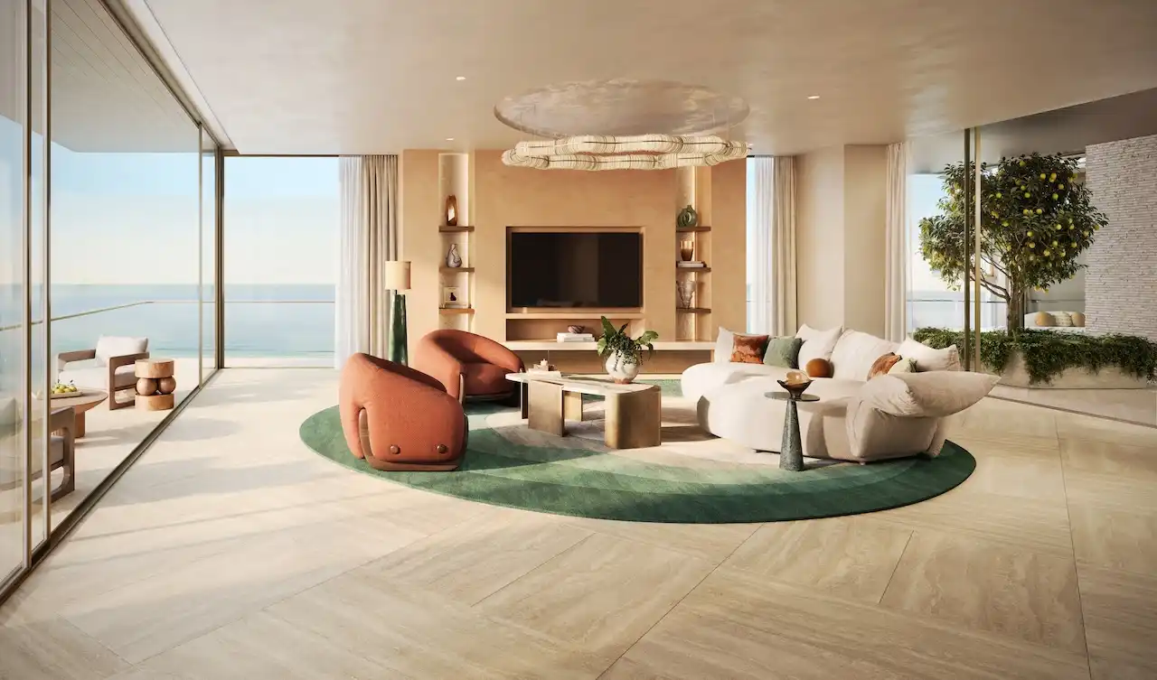 Luxury 4 bedroom apartment living room at Solaya by Meraas in Dubai, featuring an elegant open layout, refined furniture, floor to ceiling windows, private terrace and panoramic waterfront views. Presented by Tohid Fetrat.