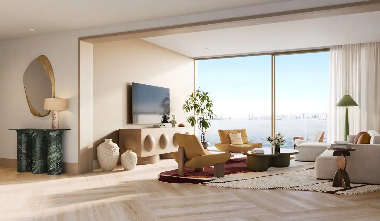 Family room of a 5 bedroom apartment at Solaya by Meraas in Dubai, featuring floor to ceiling windows, Gulf views, elegant lounge seating, natural finishes and a refined open living layout. Presented by Tohid Fetrat.