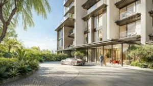 Arrival entrance of Solaya by Meraas in Dubai, featuring a refined drop off driveway, landscaped surroundings, modern low rise architecture and elegant lobby access. Presented by Tohid Fetrat.