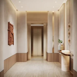 Elevator lobby interior at Solaya by Meraas in Dubai, featuring a refined minimalist design with warm wood panels, soft lighting, sculptural wall art and a calm luxury atmosphere. Presented by Tohid Fetrat.