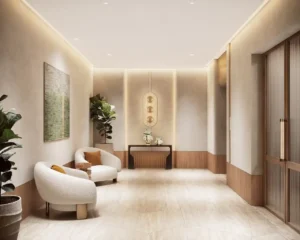 Interior lobby space of Solaya by Meraas in Dubai, showcasing a calm minimalist design with warm tones, soft seating, natural materials and refined lighting. Presented by Tohid Fetrat.