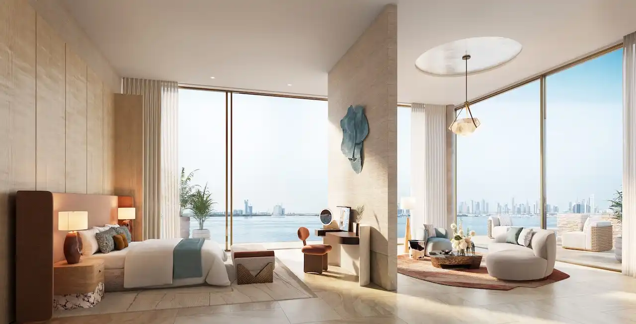 Penthouse master bedroom interior at Solaya by Meraas in Dubai, featuring a serene luxury bedroom design, floor to ceiling windows, refined finishes and panoramic waterfront and city skyline views. Presented by Tohid Fetrat.