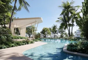 Main swimming pool at Arival Piazza Passo by Beyond surrounded by tropical landscaping, palm trees, curved water edges, shaded architectural pavilion, and serene resort style outdoor environment designed for relaxation and leisure. Presented by Tohid Fetrat.