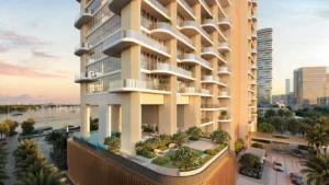 Elevated residential podium at Atelis at d3 showcasing sculptural columns, curved balconies, landscaped gardens, and waterfront surroundings within Dubai Design District. Presented by Tohid Fetrat.