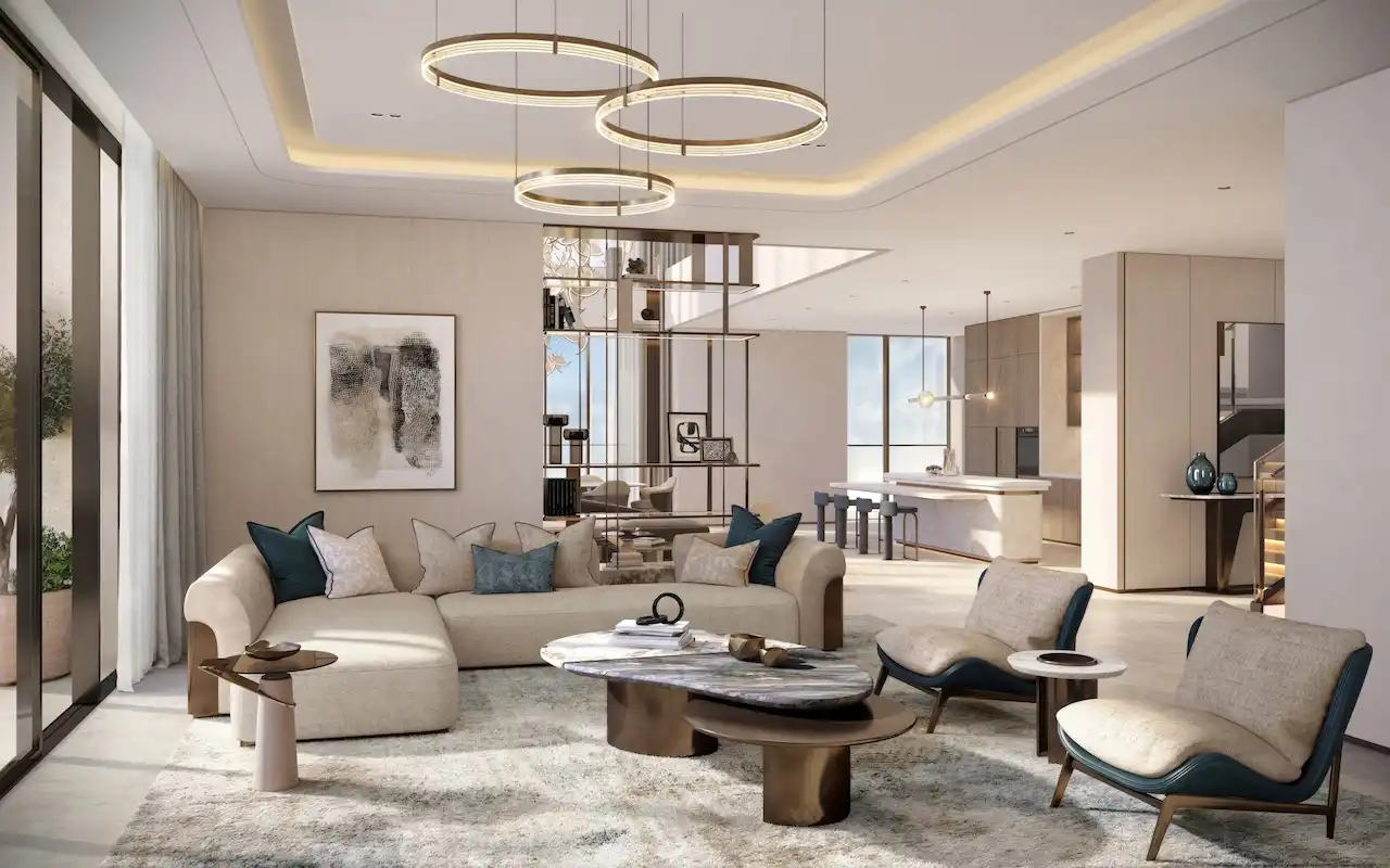 Penthouse living interior at Atelis at d3 featuring open-plan design, bespoke furniture, layered lighting, and refined finishes with seamless connection to the dining and kitchen areas in Dubai Design District. Presented by Tohid Fetrat.