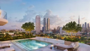 Rooftop swimming pool at Atelis at d3 overlooking the Dubai skyline, featuring elegant poolside seating, landscaped greenery, and panoramic city views at sunset in Dubai Design District. Presented by Tohid Fetrat.